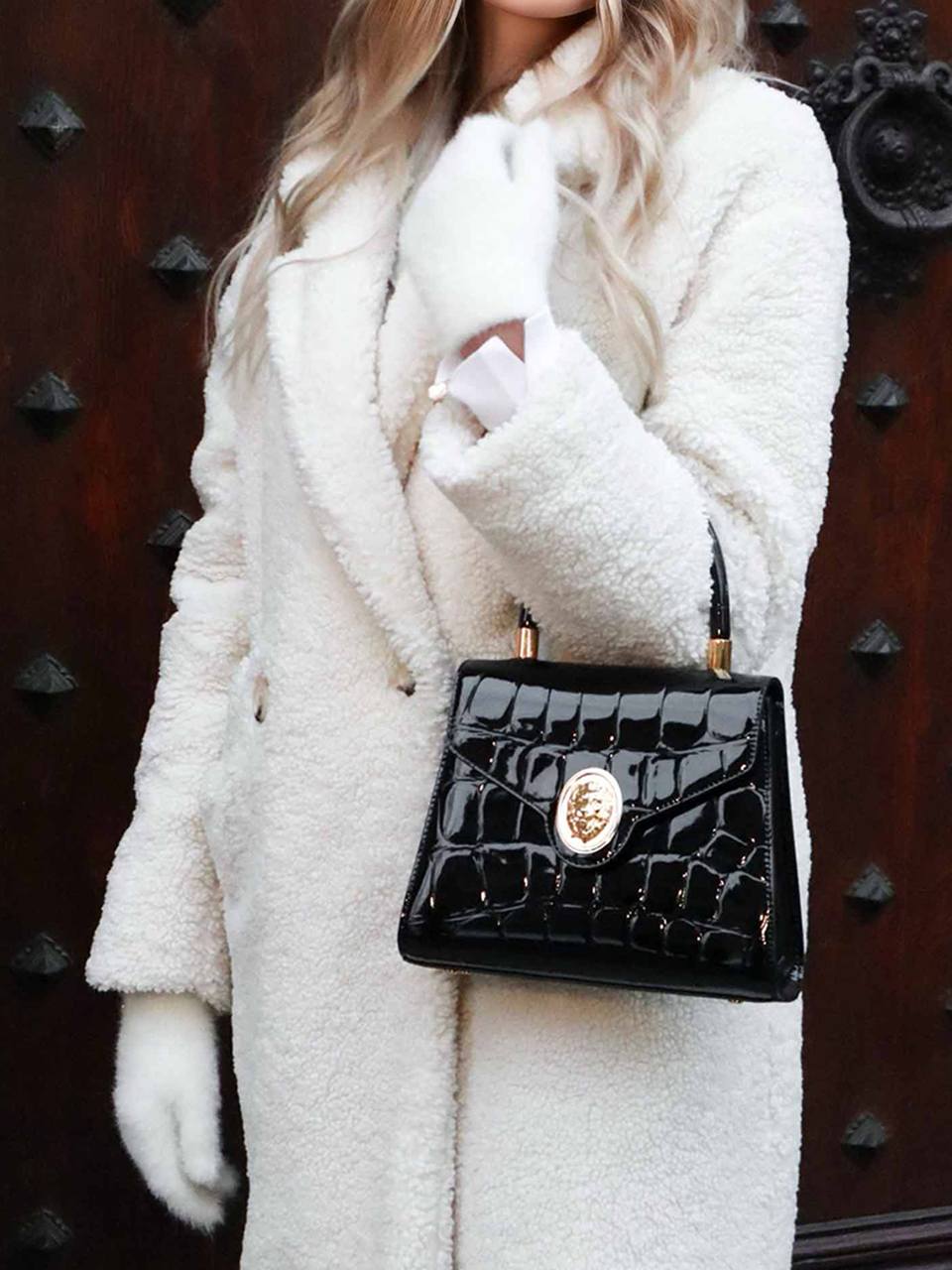 Gamberini Bag. A structured silhouette. Crafted from luxury Italian leather with 18K gold-plated Italian made accessories.
