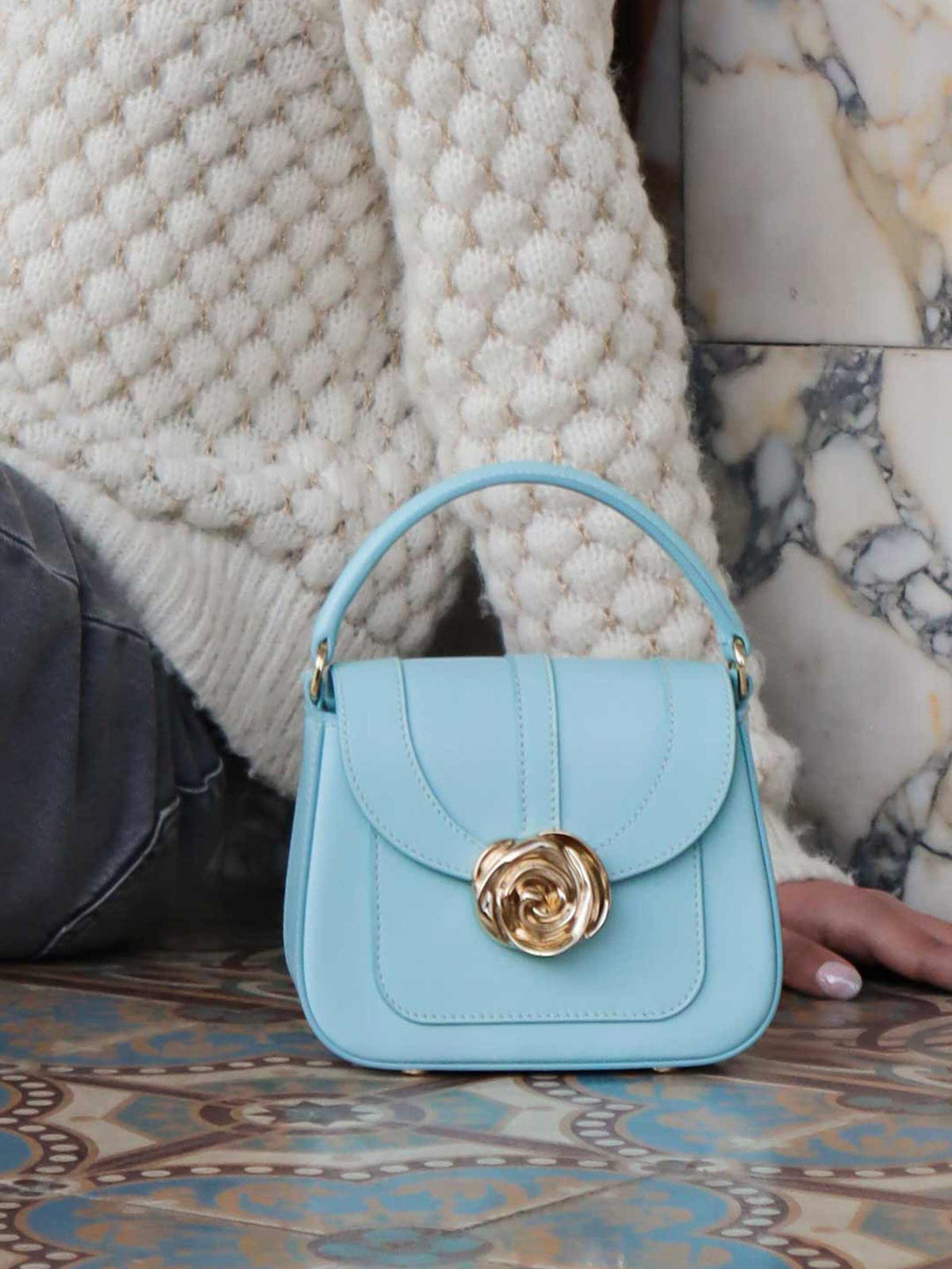 Beaumont Bag – Luxury handbag inspired by Versailles Gardens with 18-karat gold rose clasp, crafted in Italy, featuring a removable shoulder strap. French design, Made in Italy.