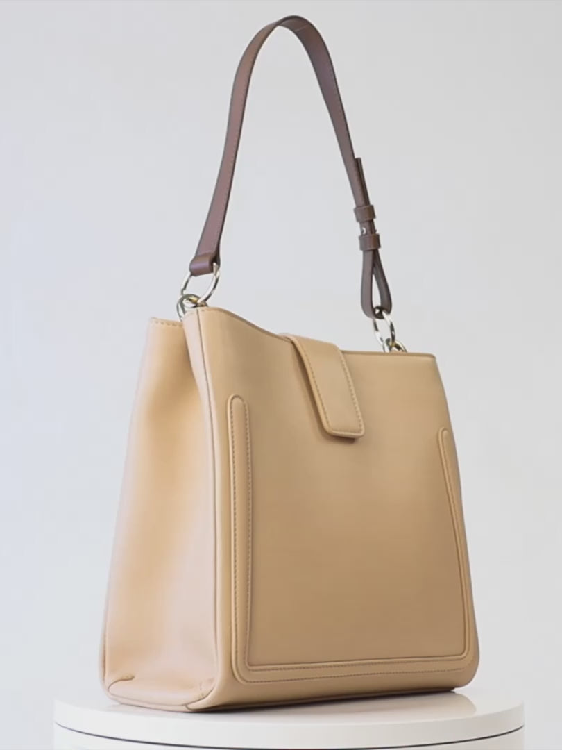 Ariel Bag – Premium Italian calfskin leather handbag. Made in Italy. Elegant, modern handbag with a contrasting shoulder strap, exclusive accessory, and sleek architectural design. Perfect for work, travel, and everyday sophistication.